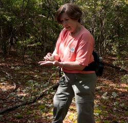 Linda Mooney, section leader, explains deer lichen