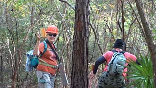 Wallis checks line of signt to previous blaze to verify visibility and placement