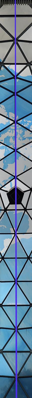 The blue line indicates how the 90th Meridian crosses Fuller Dome from north to south, going through Edwardsvile at the zenith and a vertex of the icosahedron