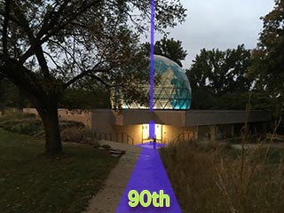Walking along the 90th Meridian leads down into and under Fuller dome mini Earth aligned