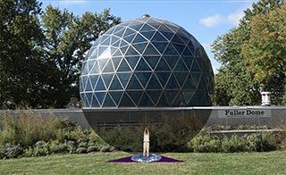 Yoga mat or rug design to give a sense of completion to being within the earth. View is outdside with cutaway view of the dome.