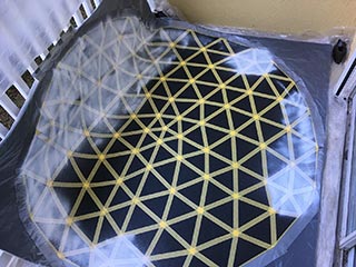 One 3 oz. can of spray paint is not enough to cover the mat