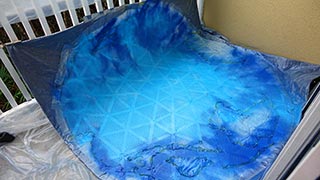Blue and Neon Blue paint sprayed for the ocean