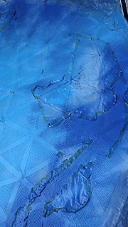 Detail of the painted ocean/continent outlines